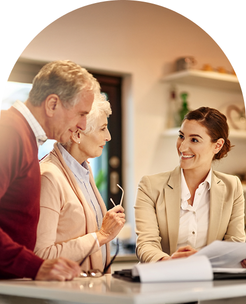 woman speaking with an older couple 